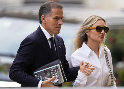 Hunter Biden, left, arrives to federal court with his wife, Melissa Cohen Biden, Thursday, June 6, 2024, in Wilmington, Del. (AP Photo/Matt Slocum)