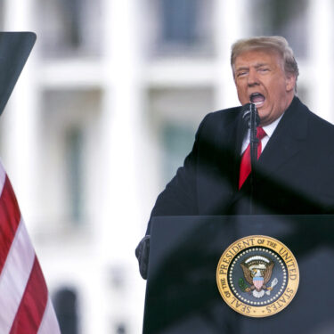 FILE - President Donald Trump speaks during a rally protesting the Elector College certification of Joe Biden's win in the 2020 presidential race, in Washington, Jan. 6, 2021. Trump on July 2, 2024, misrepresented in a social media post what the U.S. Supreme Court's Monday ruling on presidential immunity means for his civil and criminal cases. But none of Trump's pending cases have been dismissed as a result of the ruling, nor have the verdicts already reached against him been overturned. (AP Photo/Evan Vucci, File)