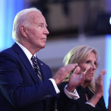 President Joe Biden, left, and first lady Jill Biden applaud before Biden delivers remarks on the 75th anniversary of NATO at the Andrew W. Mellon Auditorium, Tuesday, July 9, 2024, in Washington. (AP Photo/Evan Vucci)