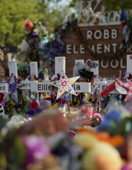 Crosses flowers and other memorabilia form